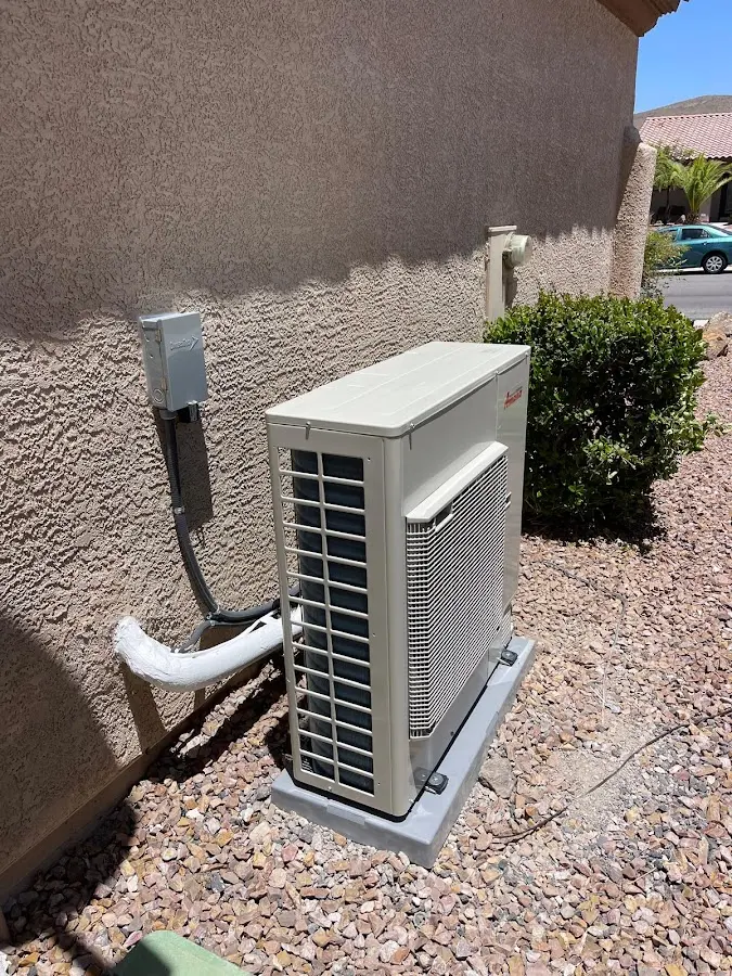 Residential air conditioning condenser unit in Gunnison